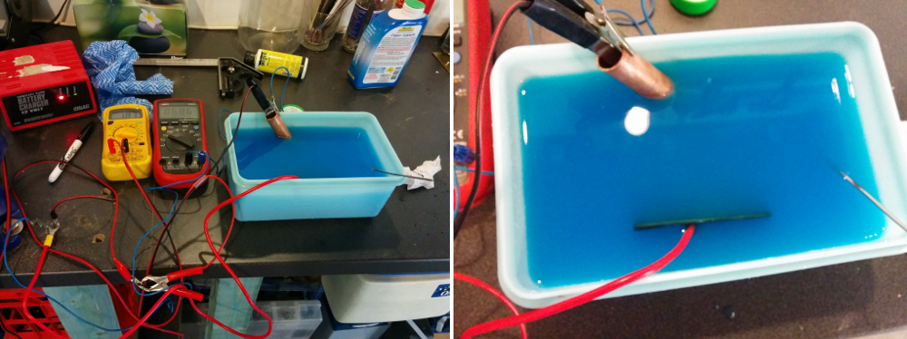This shows the full setup. On the left is the battery charger and multimeters to monitor the current and voltage. The right shows how the electrodes are positioned in the bath