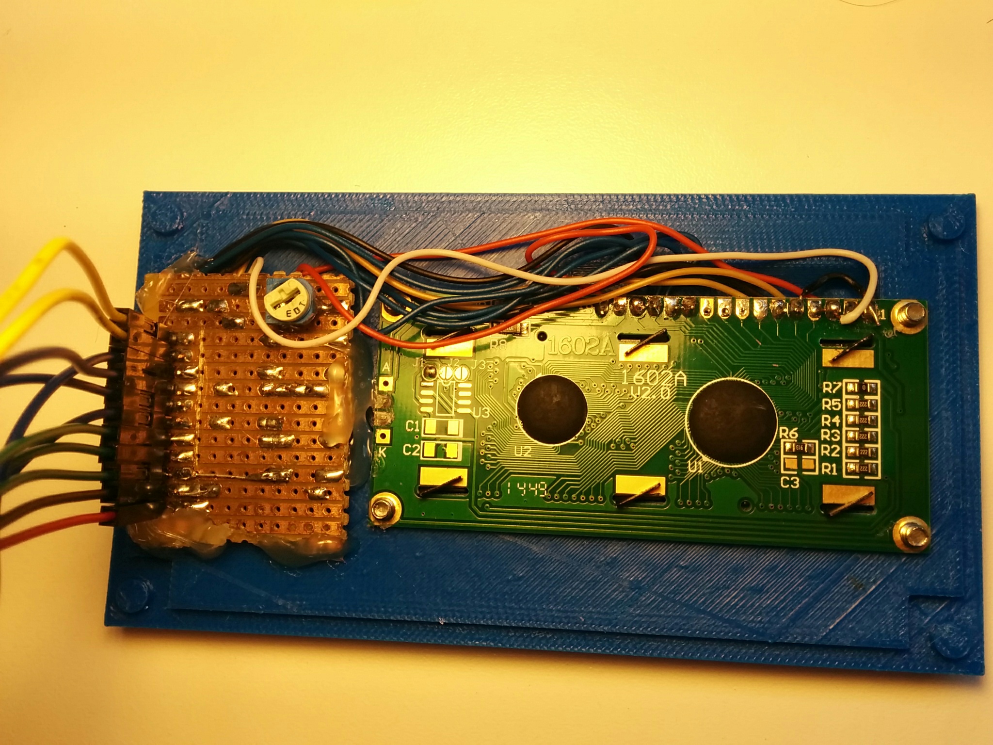 LCD and pushbuttons mounted on the lid 