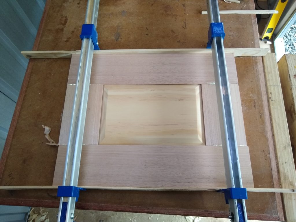 Clamping the door while the glue dries