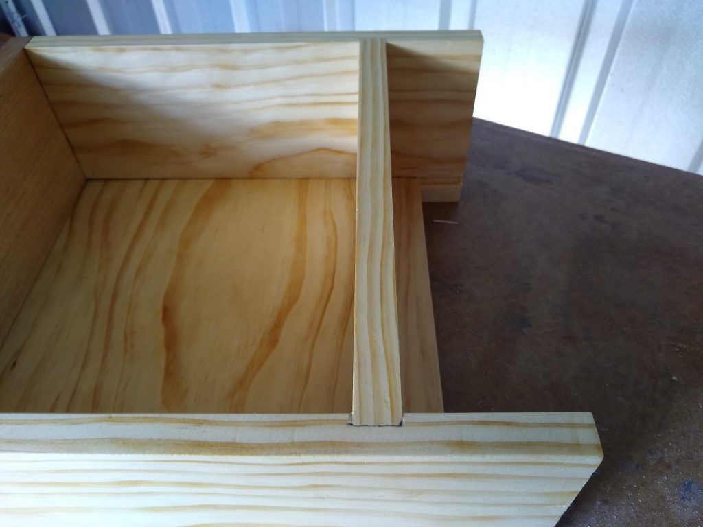 Dado complete and base fitted. The grain of the base runs side so side so expansion occurs front to back