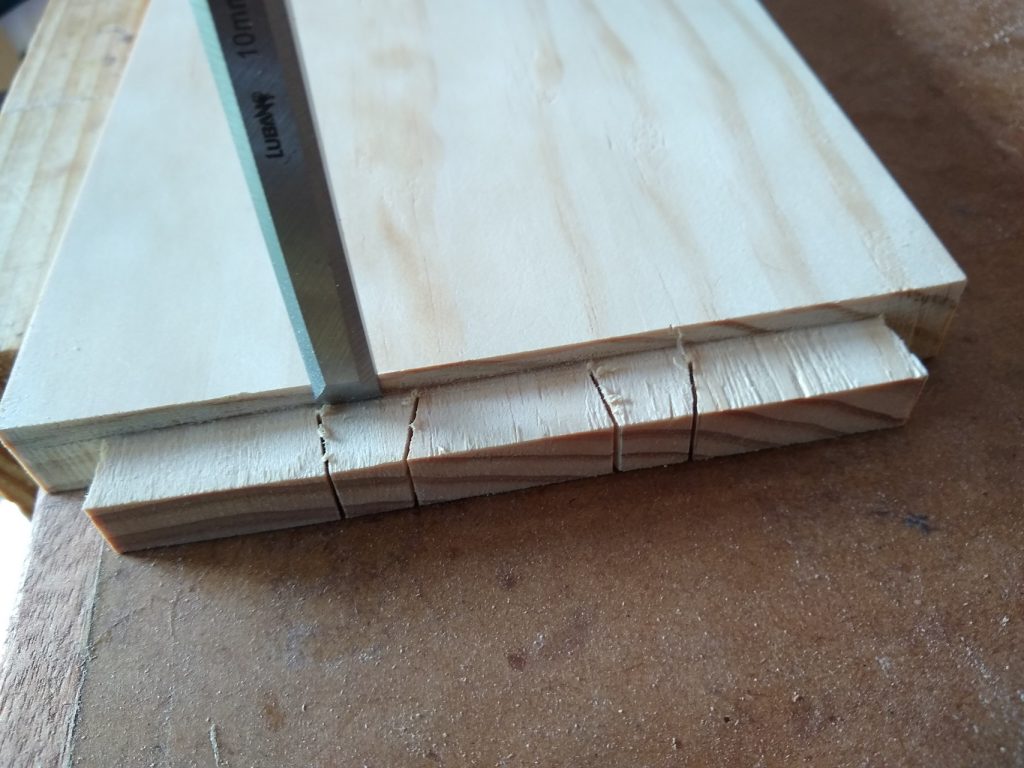 Chisel out the waste, alternating between chopping down, and removing the waste