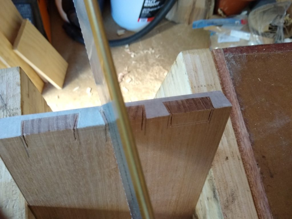 Cut the pins at a 45 degree angle to avoid cutting through the front